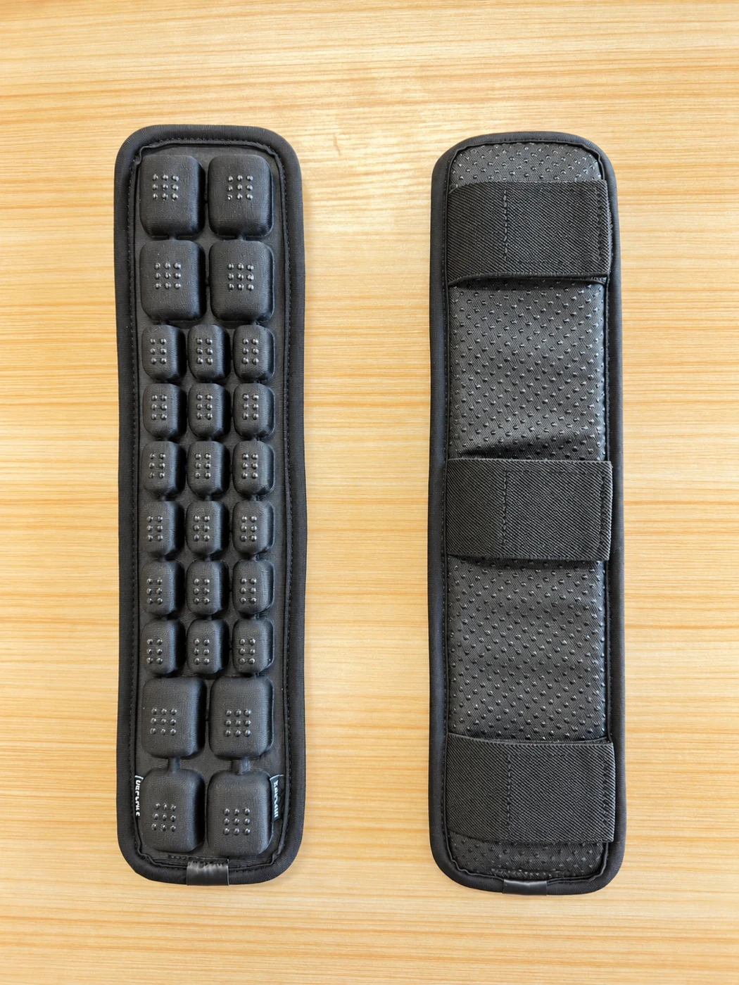 Front and back of the black AJ Tool Belt Air Cushion Pad.
